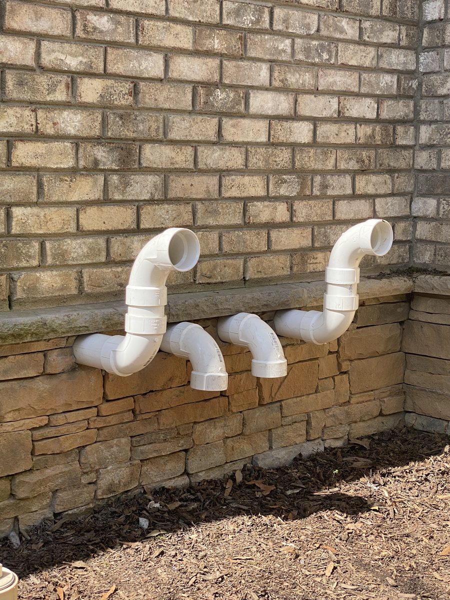 PVC vent pipes for a high-efficiency furnace installed by Penguin Air & Plumbing